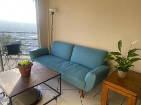 Habitación en departamento con vista a la ciudad
